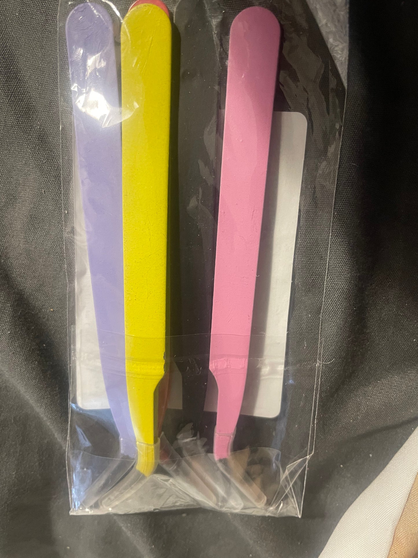 Eye lash tweezers
